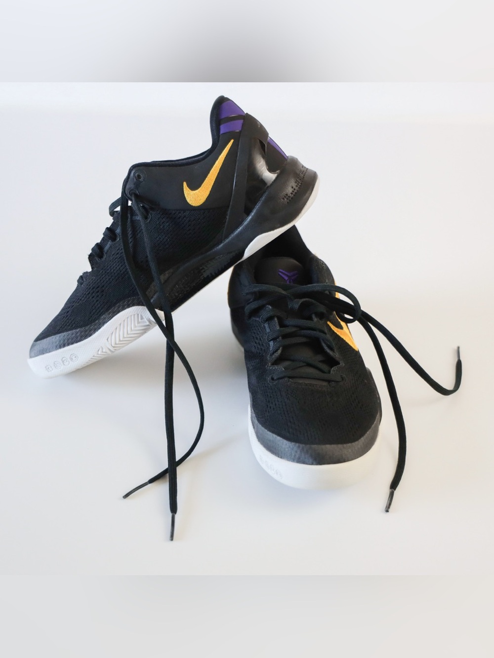 Nike Boys Black Kobe Basketball Shoes with Yellow Swoosh and Purple Accents
